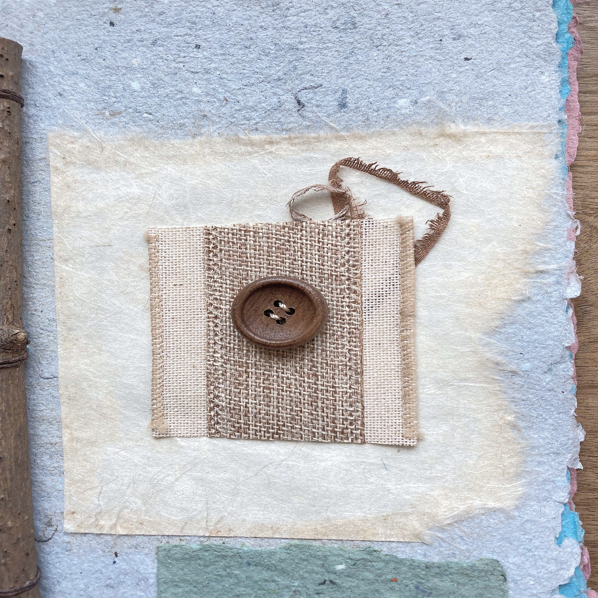 Art Journal with Handmade Paper Cover, Featuring Vintage-Style Button on Cover, Variety of Mixed Media Pages, Hand Sewn Binding with Stick