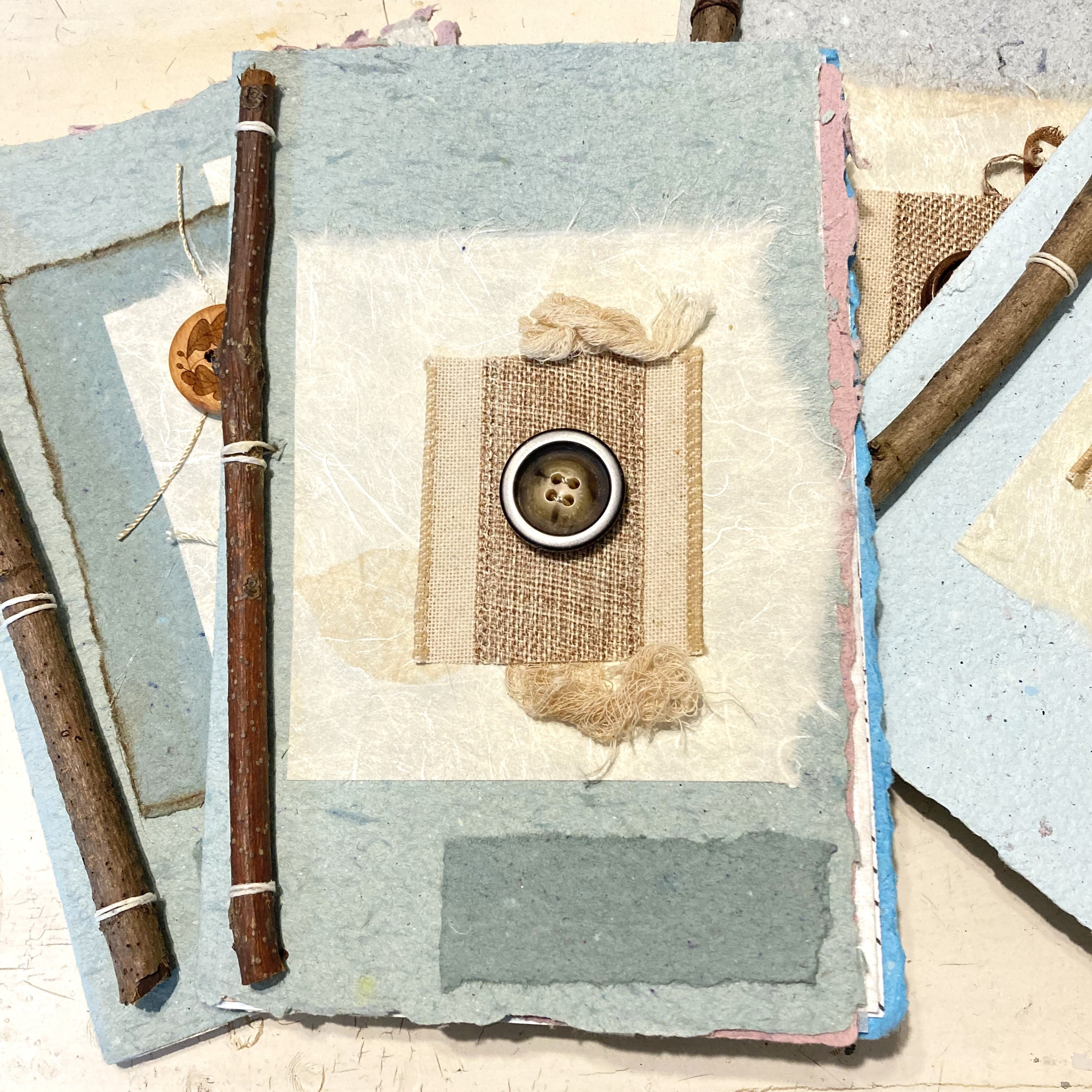 Art Journal with Handmade Paper Cover, Featuring Vintage-Style Button on Cover, Variety of Mixed Media Pages, Hand Sewn Binding with Stick