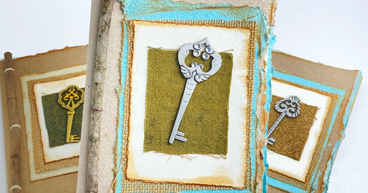 Junk journal with vintage key and handmade paper