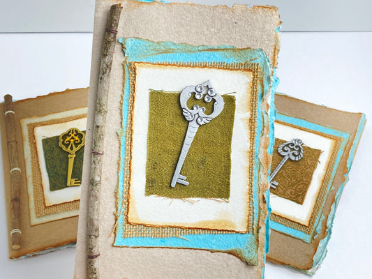 Junk journal with vintage key and handmade paper