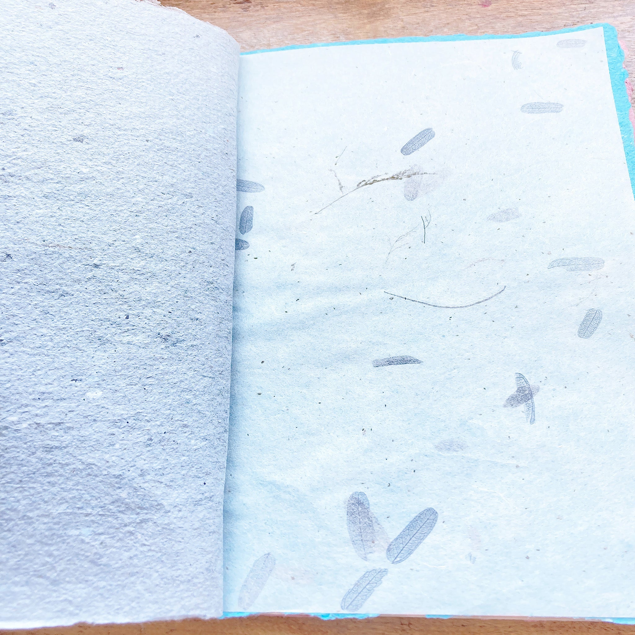 Art Journal with Handmade Paper Cover featuring a Vintage-style Key, Variety of Mixed Media Pages, Hand Sewn Binding with Stick Inserted